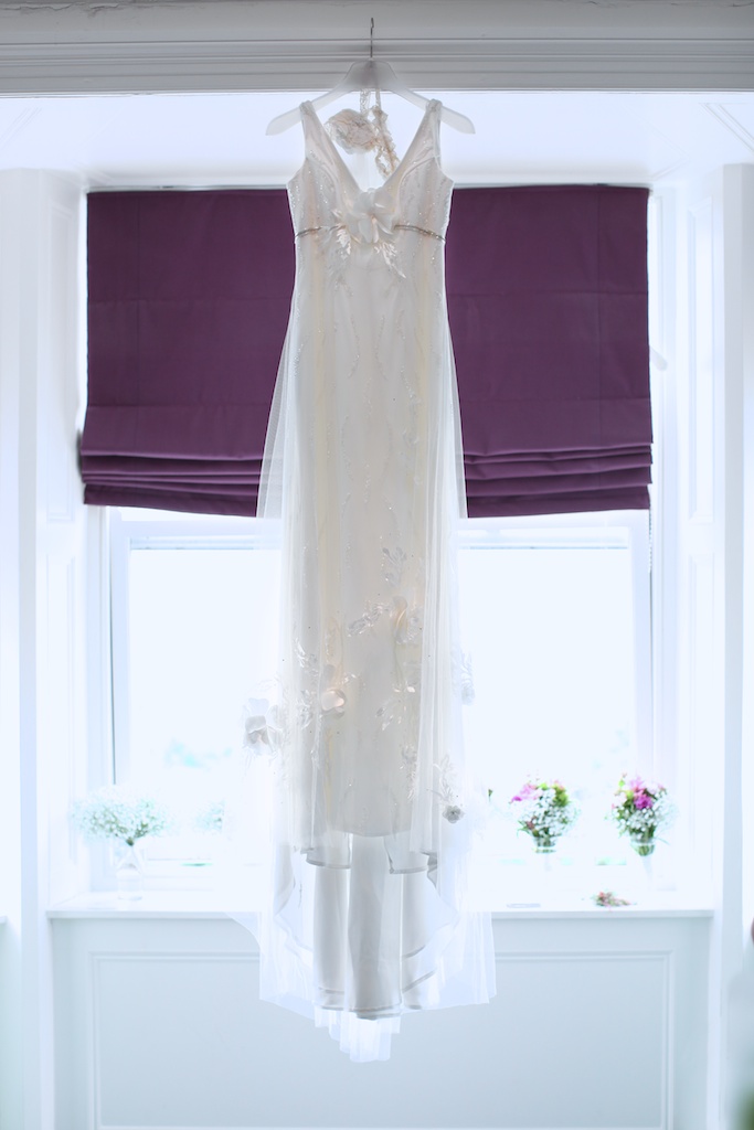 hanging wedding dress purple
